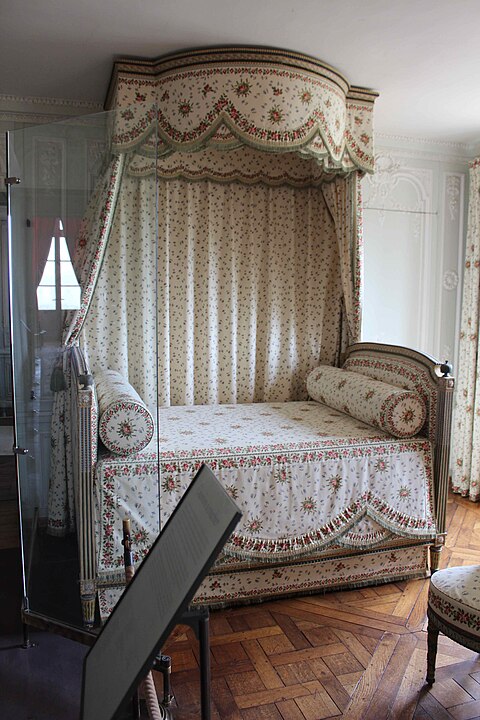 Marie Antoinette's bed, which has a baldachin, in the Petit Trianon (Versailles, France).