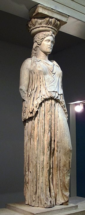 The caryatid taken by Elgin from the Erechtheion, standing in contrapposto, displayed at the British Museum.