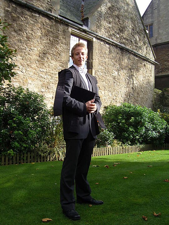 An undergraduate student at the University of Oxford in subfusc for Matriculation in Michaelmas.